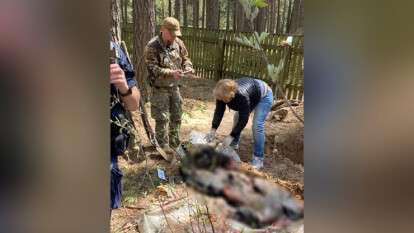 Тела двух убитых оккупантами парней