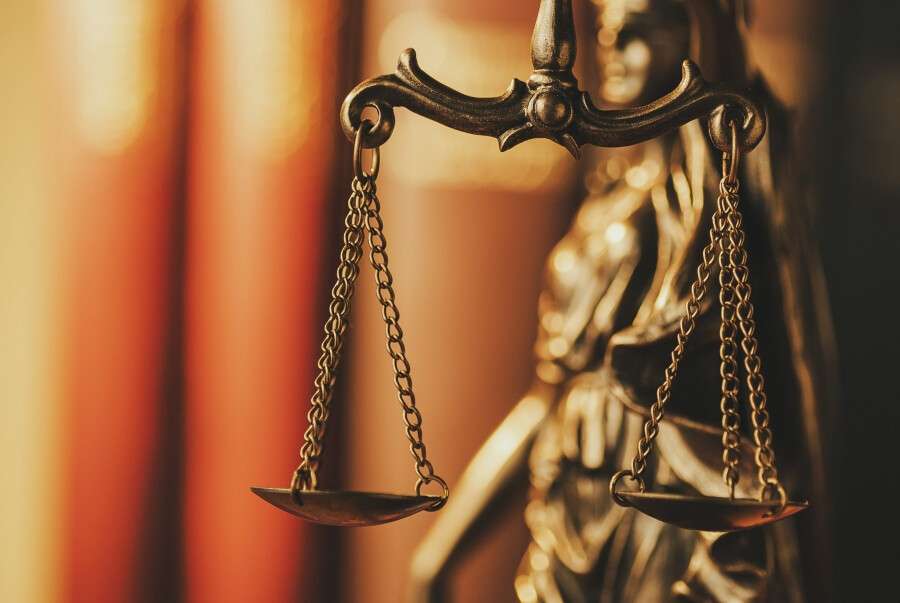 brass-scales-of-justice-in-a-close-up-view-MN6ZJSB-min-scaled